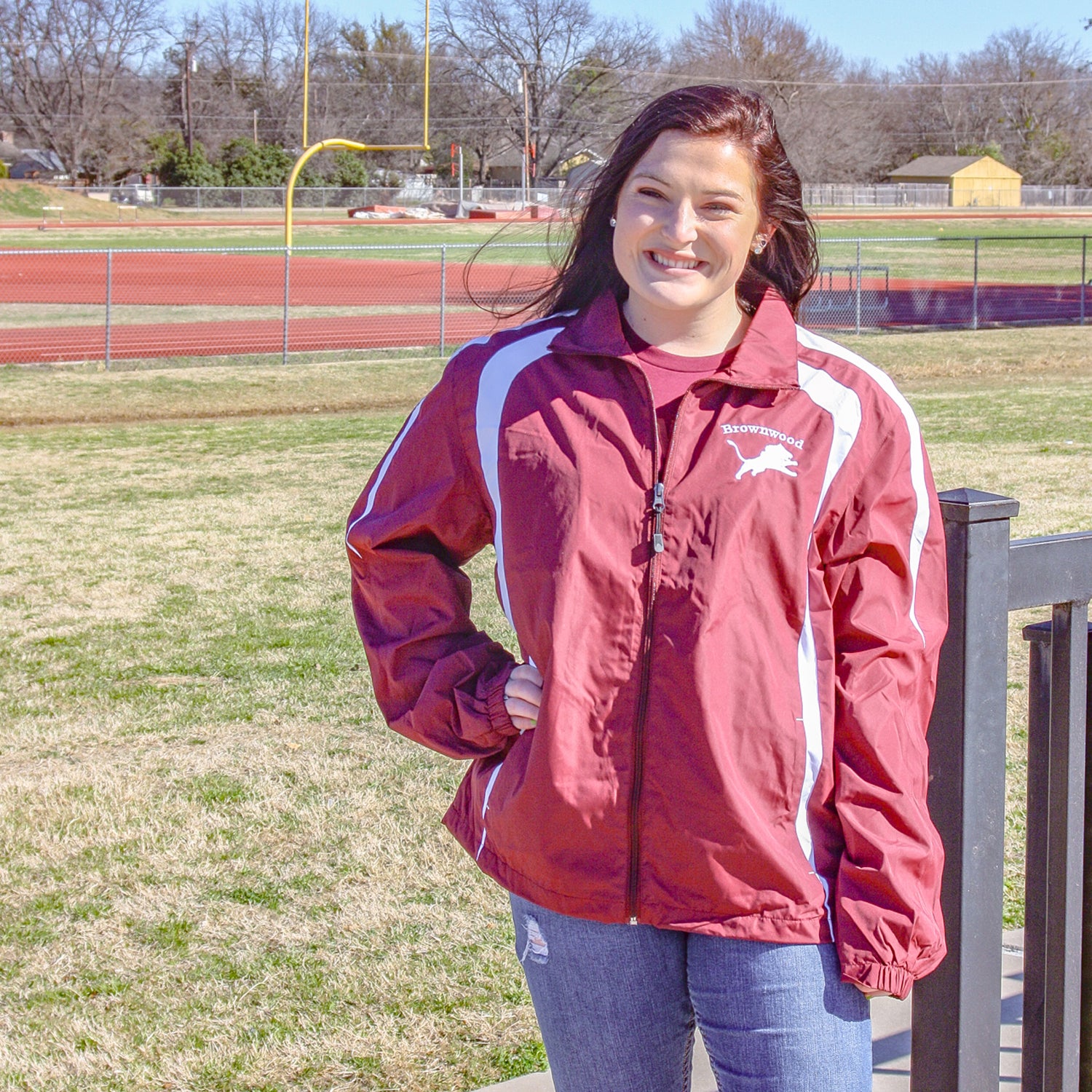 Maroon and white windbreaker top